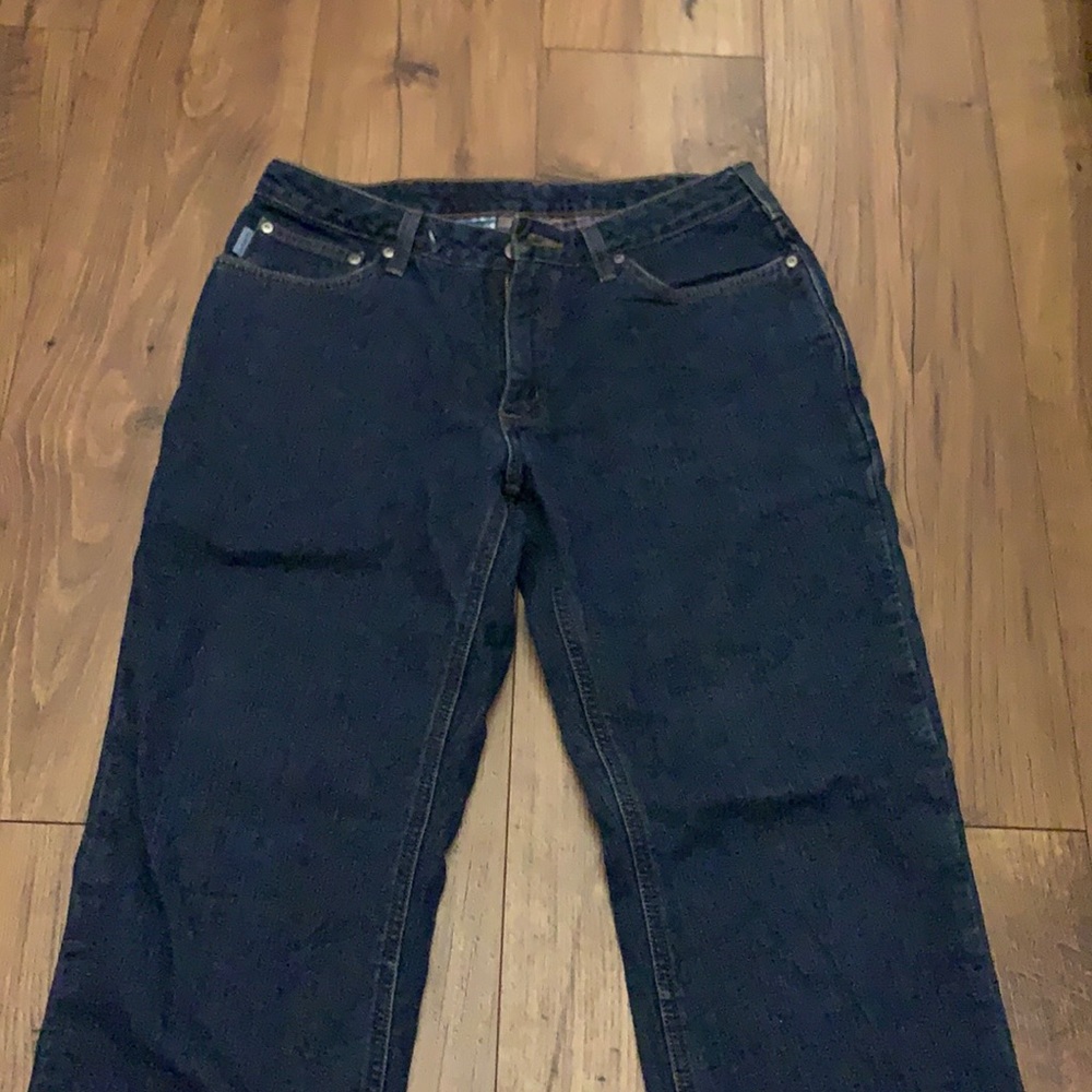 cute relaxed fit Carhartt blue jeans. size 8 x 32.